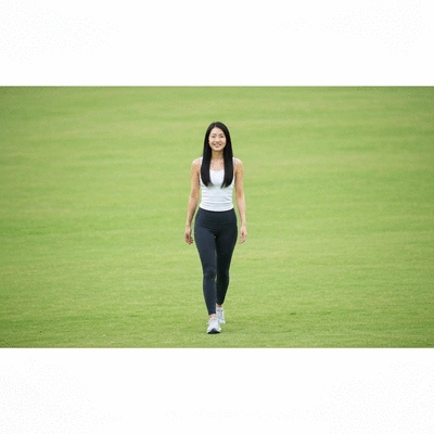 Person walking outdoors after a meal, illustrating improved digestion and gut health